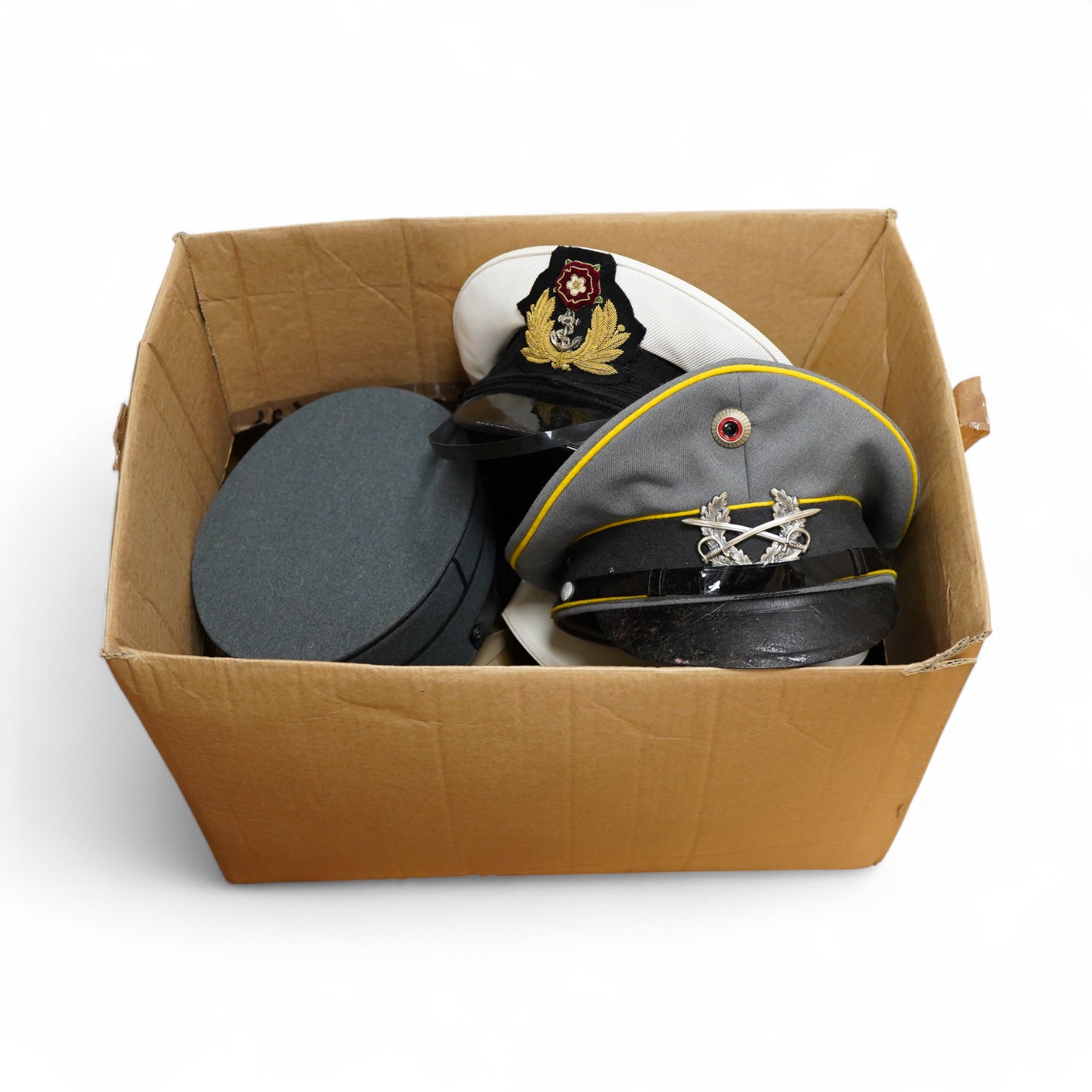 A collection of military and military style caps